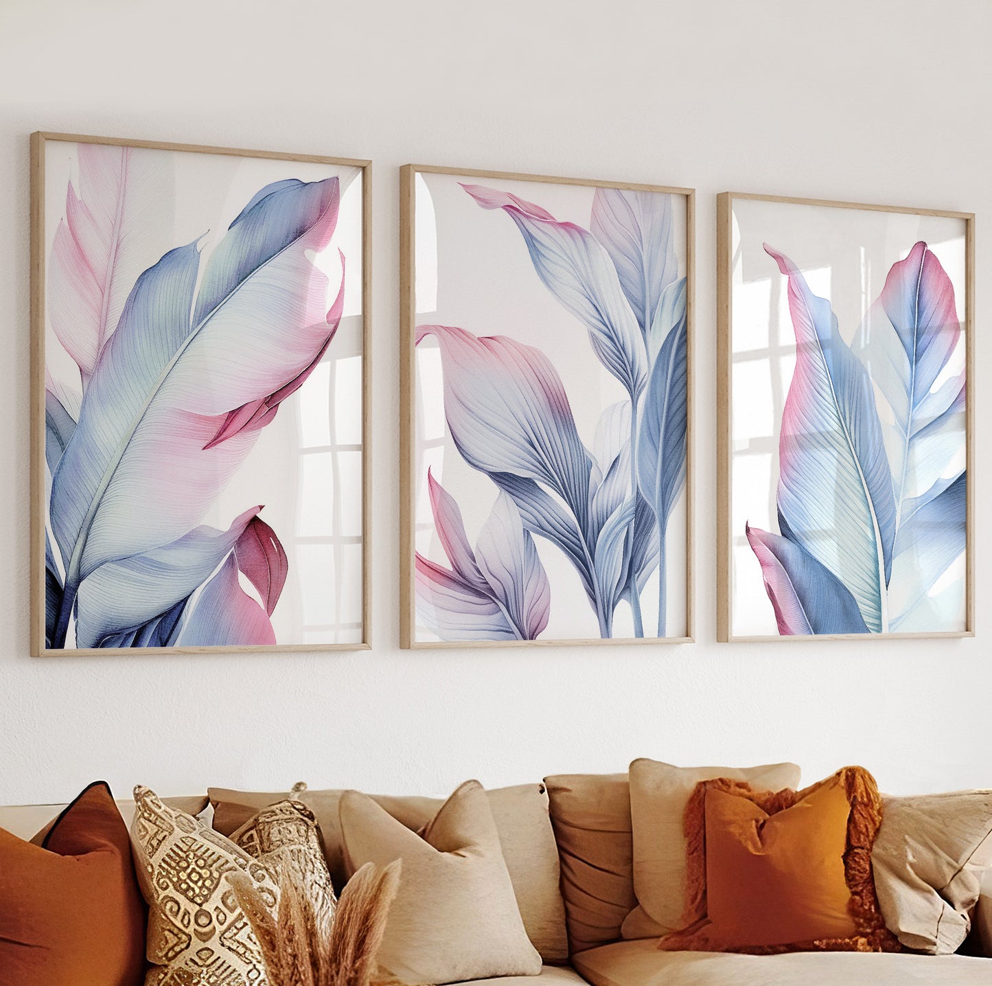 Framed abstract botanical leaf poster in blush pink and soft blue tones, ideal for modern interiors.
