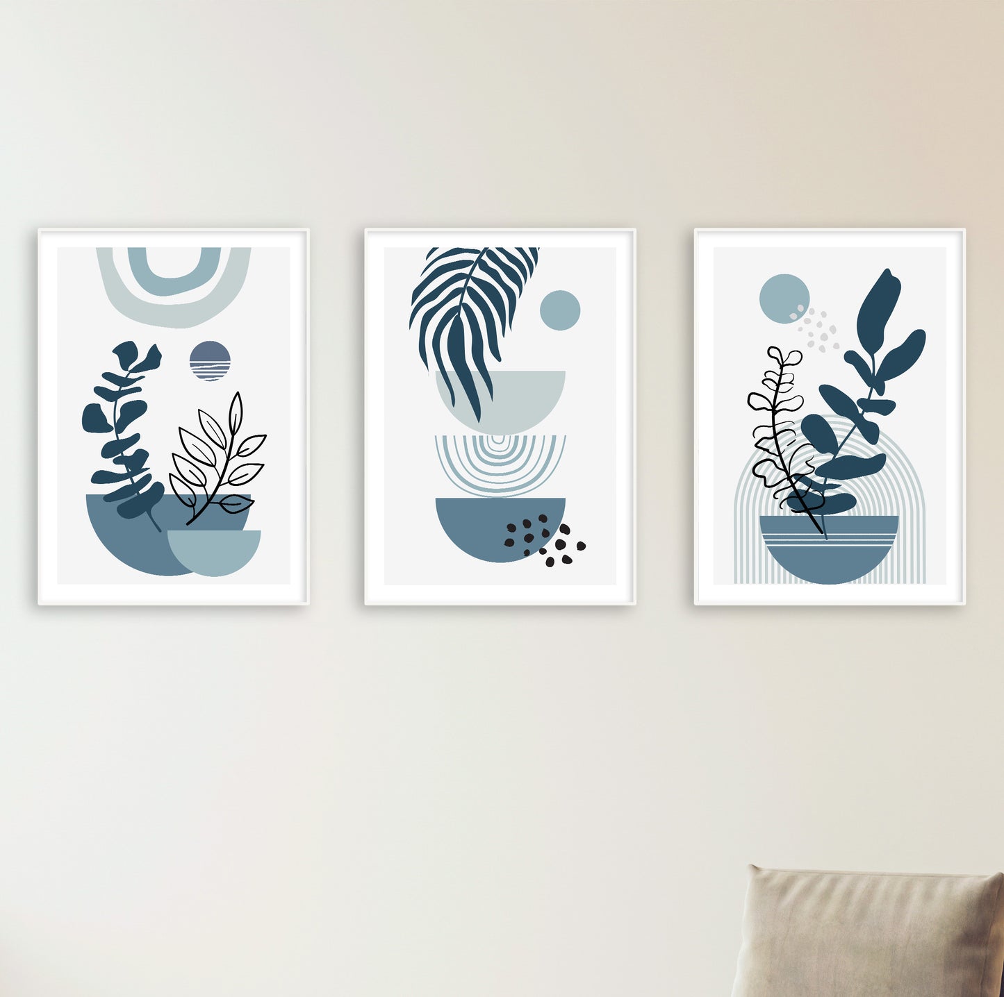 Set of three minimalist posters combining clean shapes, plants, and cool-toned color palette.