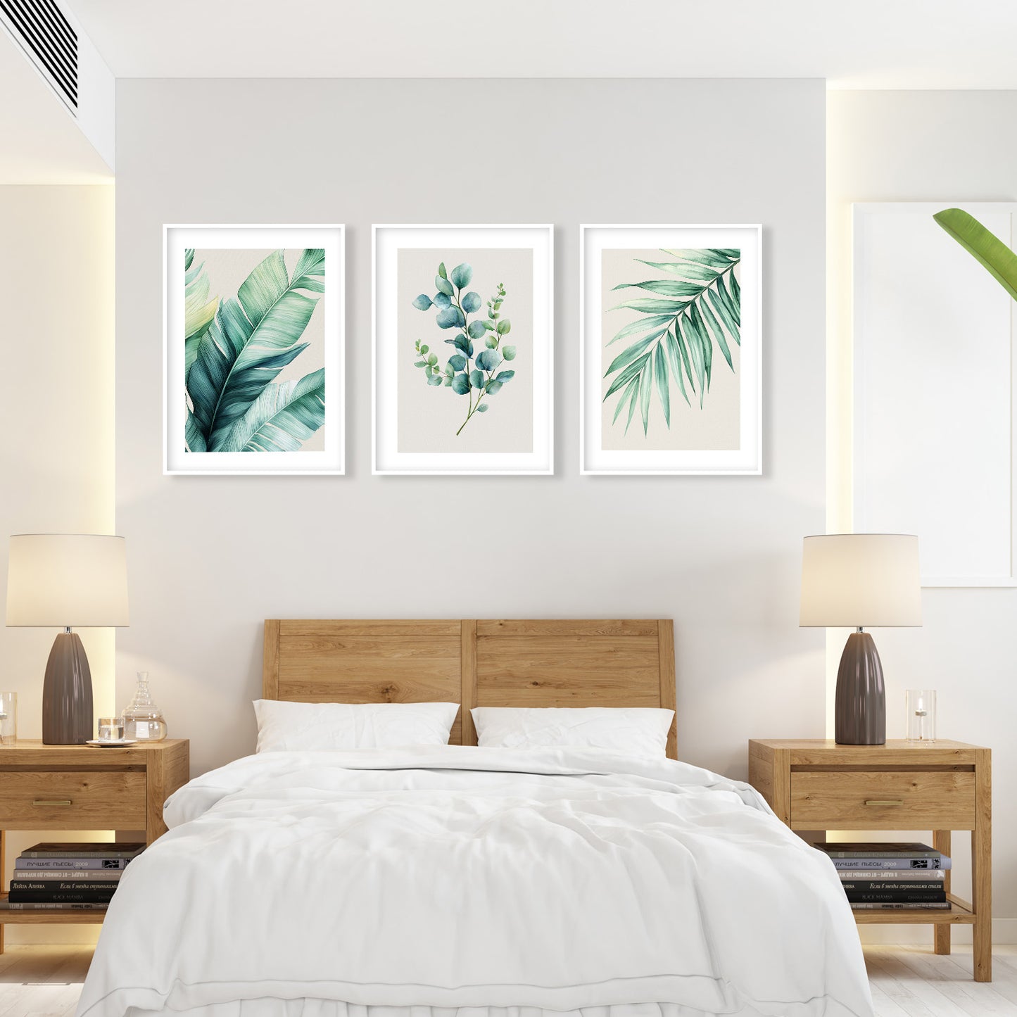 Elegant watercolor botanical prints showcasing lush green palm and banana leaves with delicate eucalyptus branches
