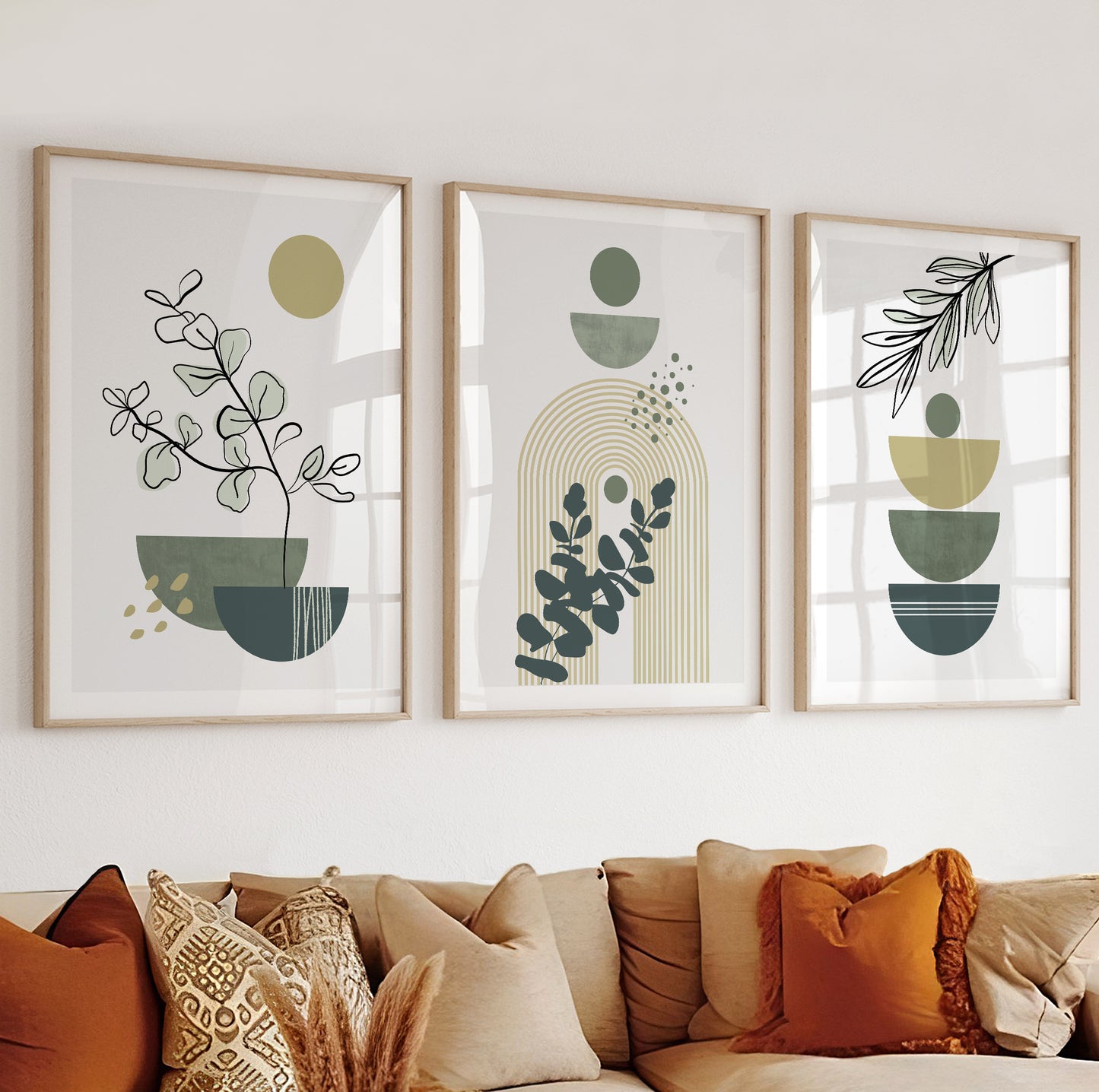 Graphic print with golden arch shapes and green botanical silhouettes in modern minimalism.