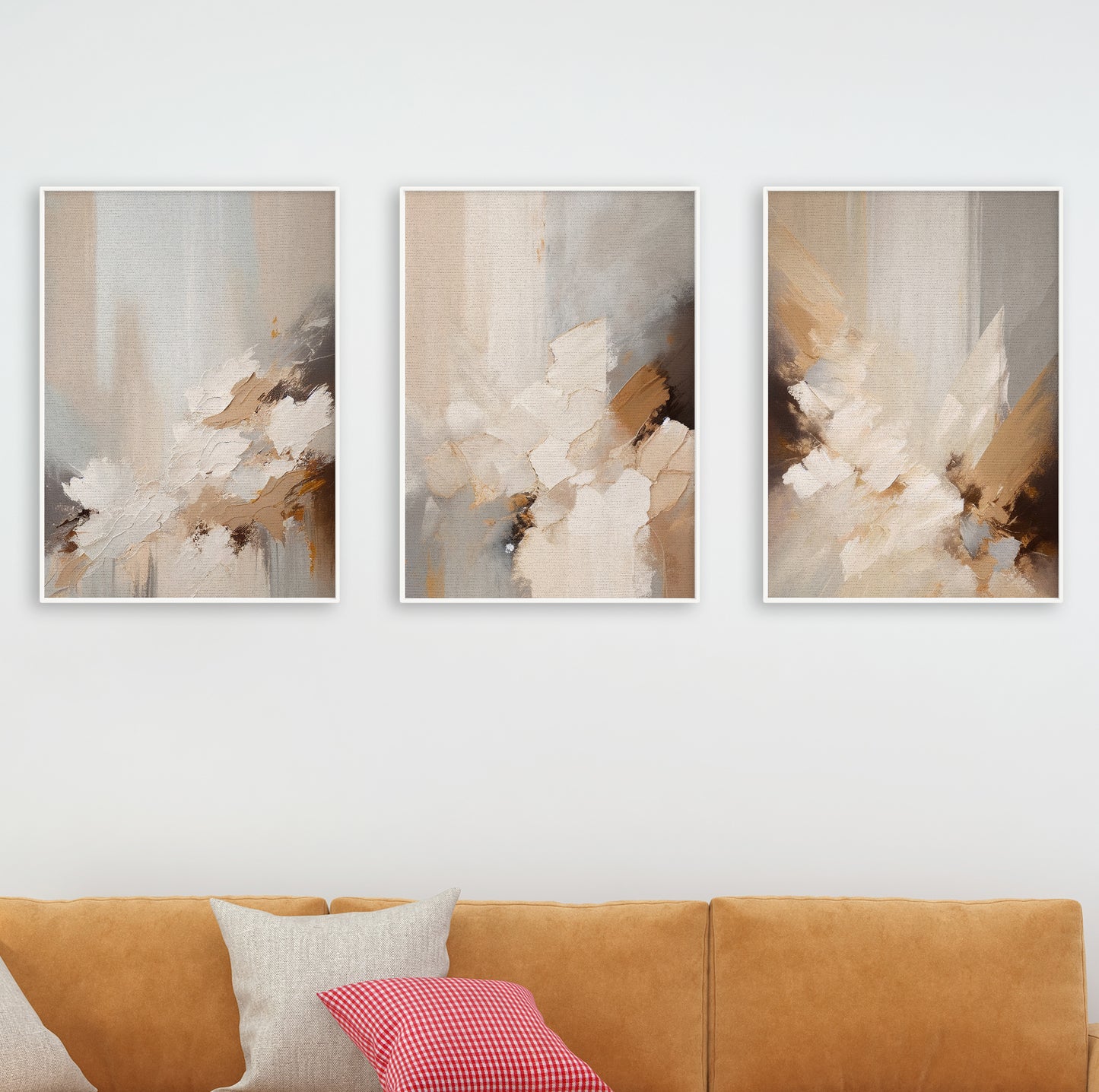 Neutral abstract print set displayed on a white wall with natural wood frames for a warm, modern feel.