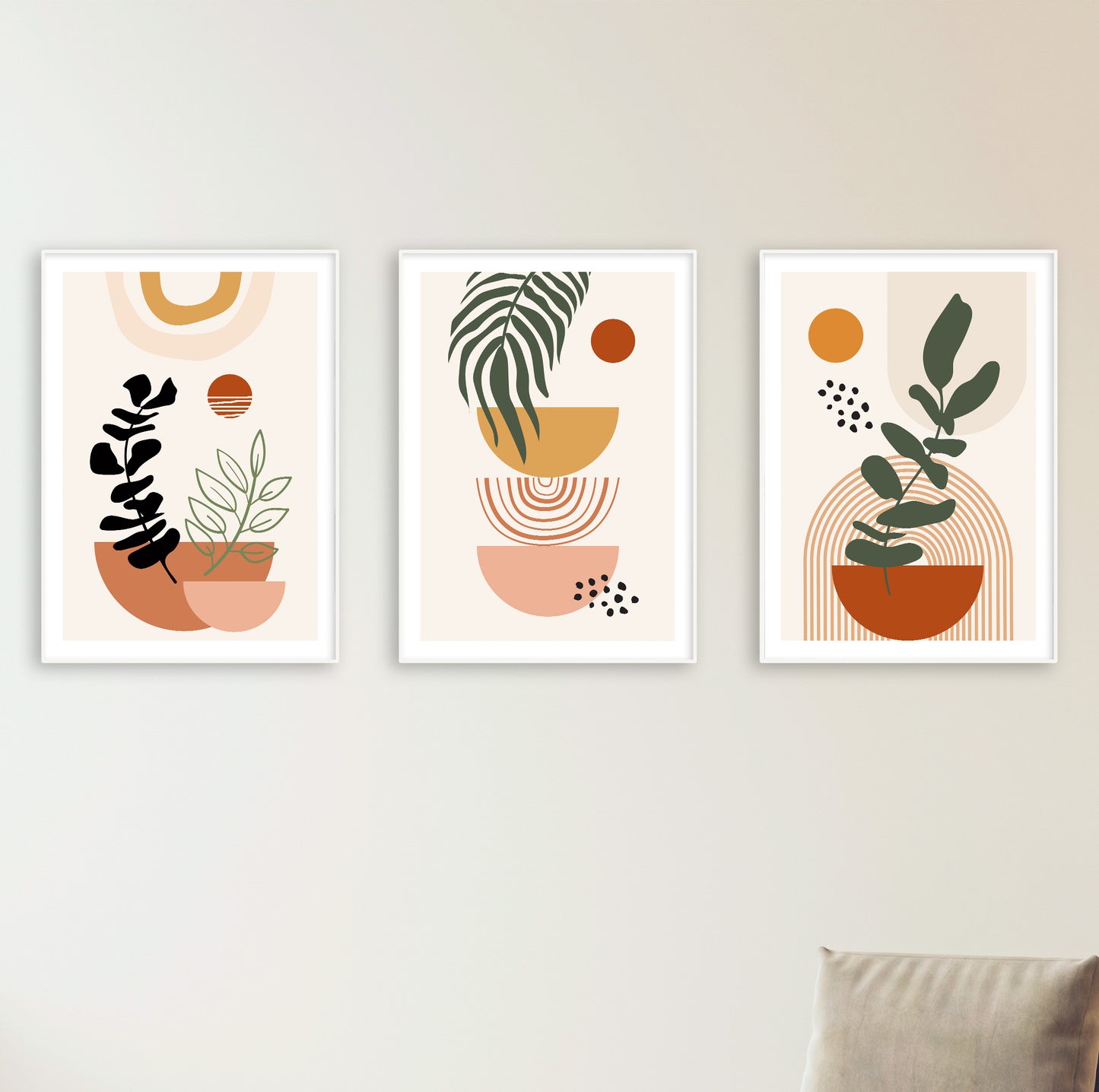 Set of three modern abstract posters featuring simplified plants and earthy shapes in a cohesive palette.