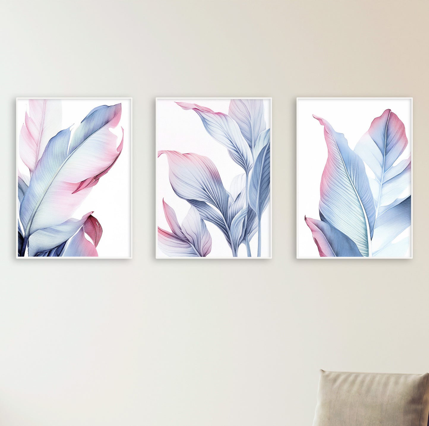 Dreamy pastel leaf poster trio displayed in a modern setting, featuring natural light reflections.