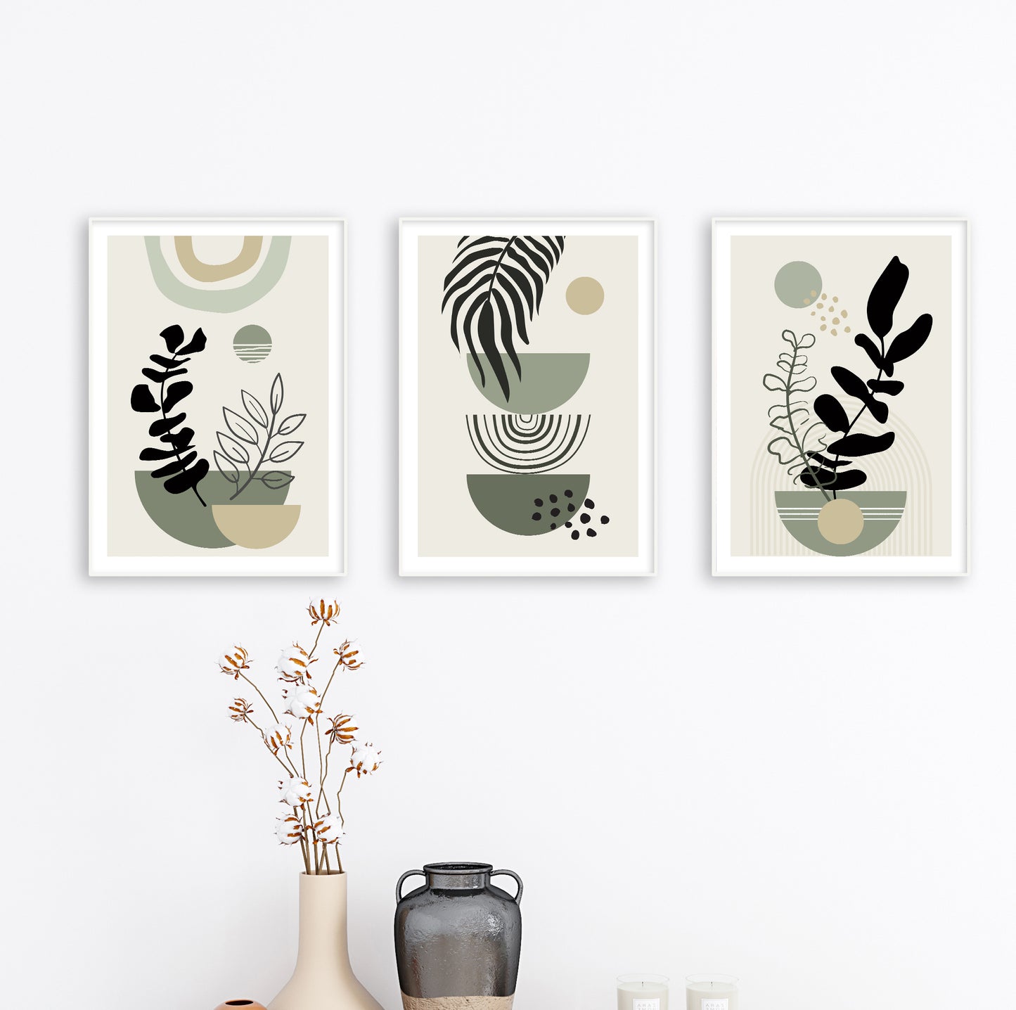Minimalist wall print with leafy silhouette in muted green tones and round graphic elements.