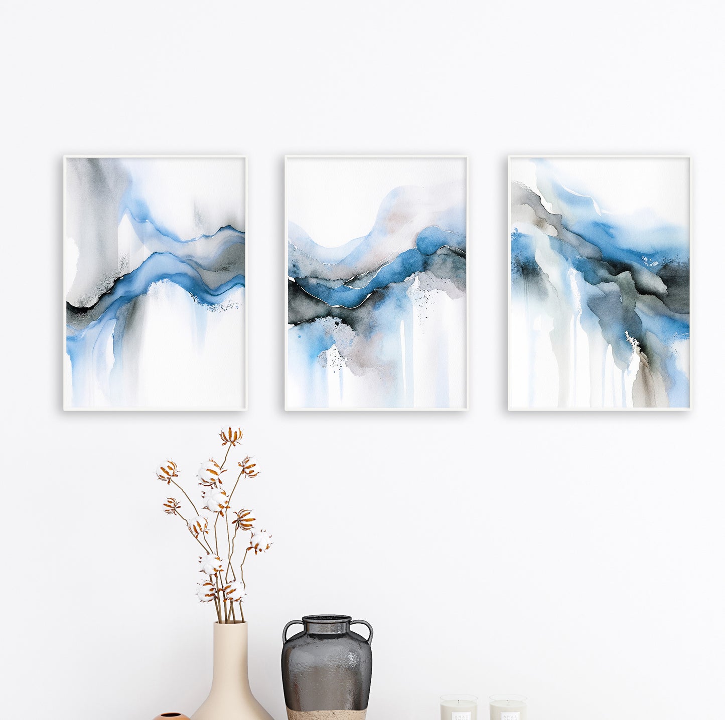 Abstract art triptych featuring soft brush textures and elegant fluid forms in cool tones.