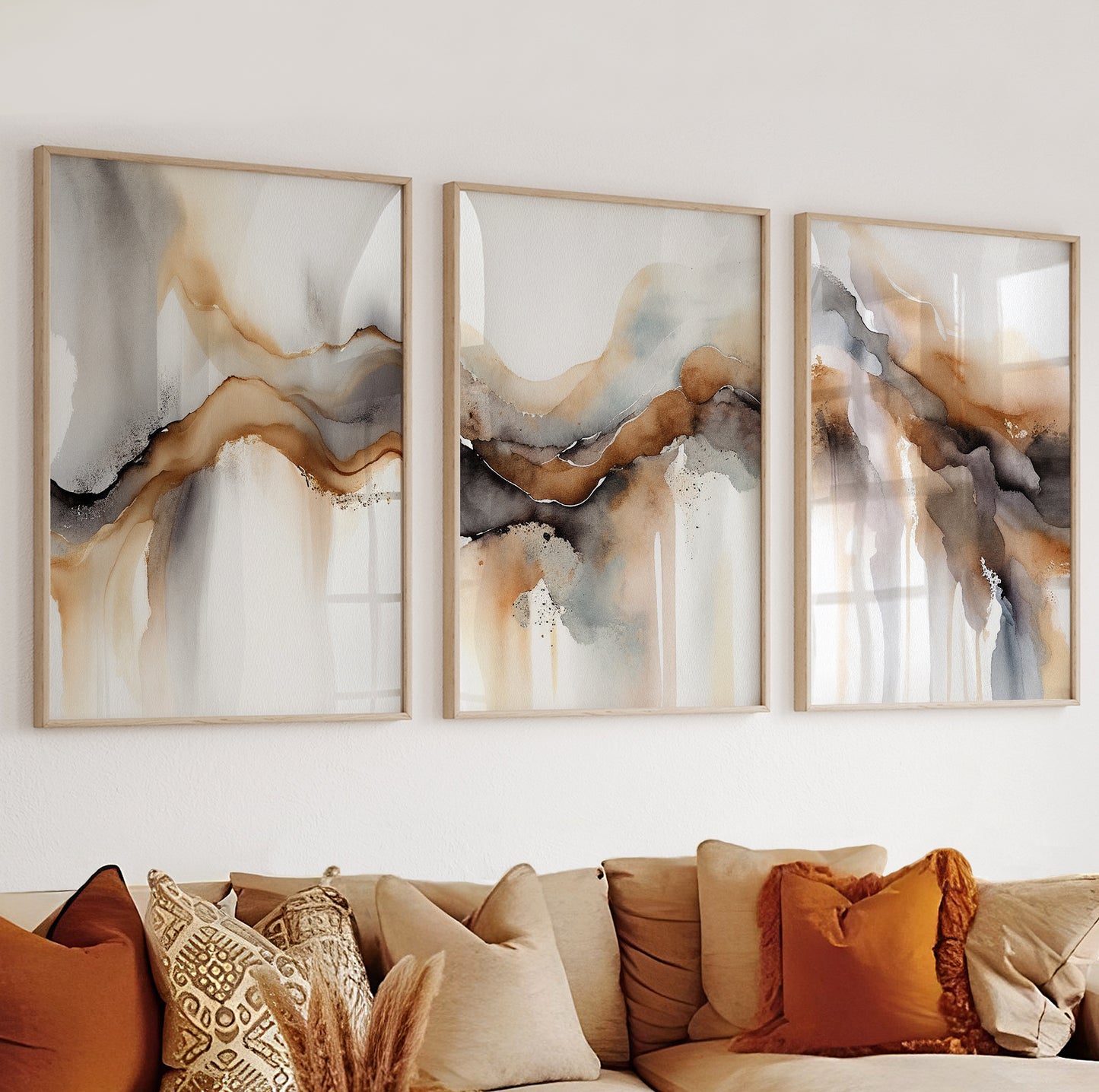 Framed abstract posters featuring a trio of watercolor-inspired organic patterns in earthy tones.
