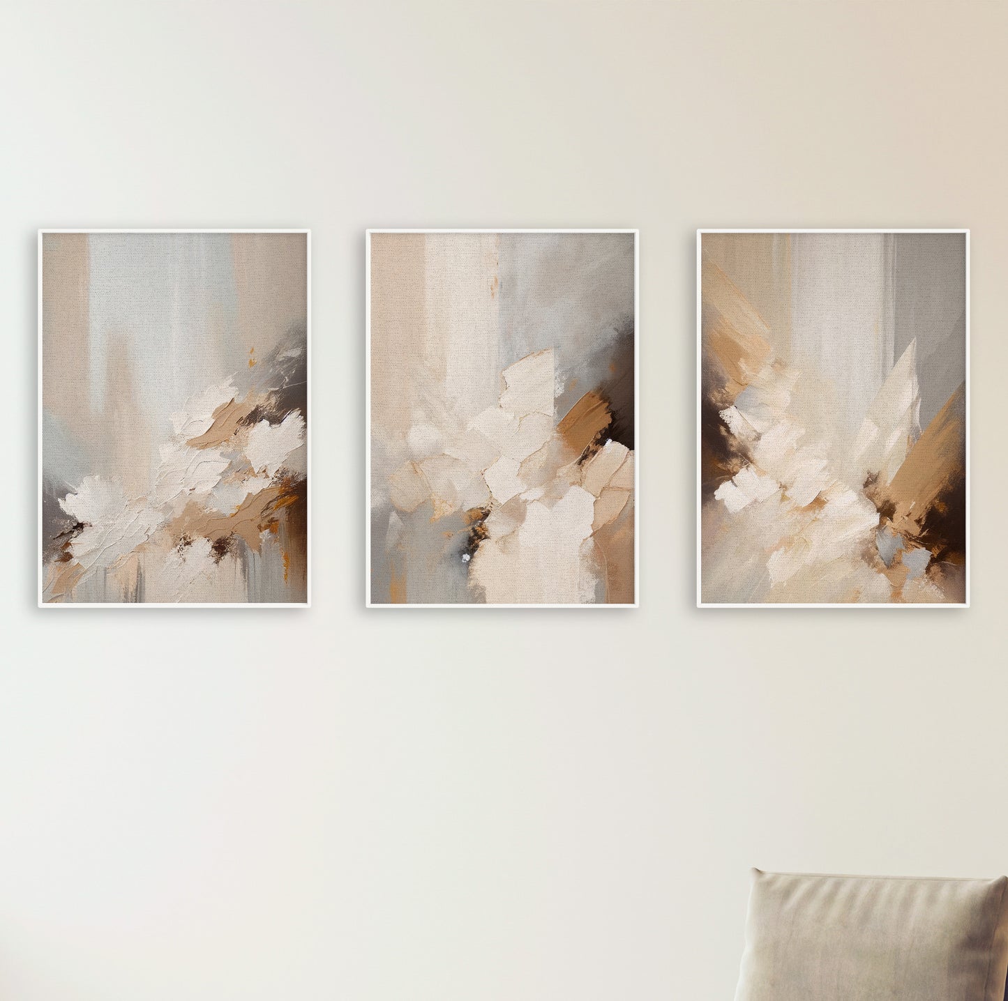 Three abstract prints with soft movement in a palette of beige, taupe, cream, and hints of burnt sienna.