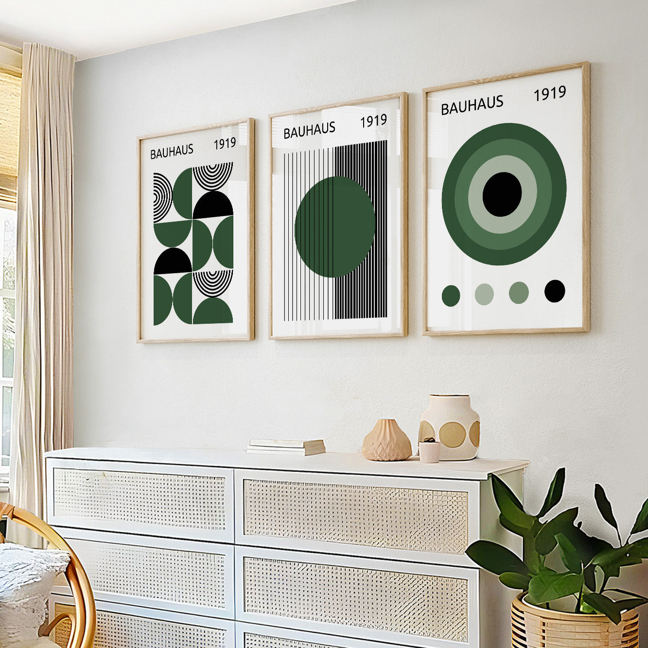 Trendy retro Bauhaus 3-piece wall art set in dark green and black for modern home decor.