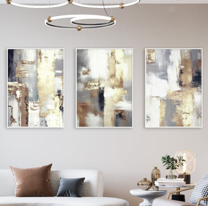 Abstract triptych in gold and beige for contemporary minimalist spaces.

