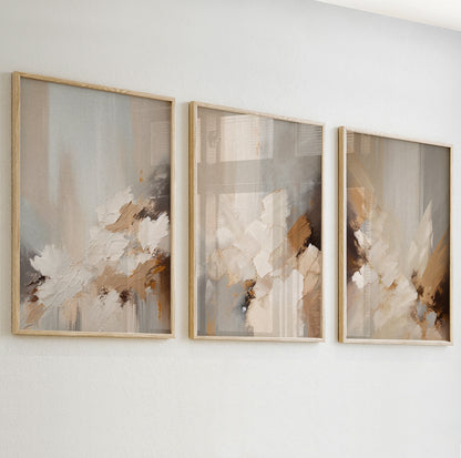Neutral abstract artwork featuring soft beige and cream tones with flowing brushstroke texture.

