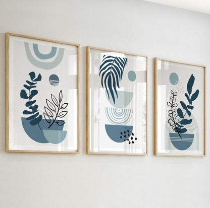 Abstract plant wall art with black and white botanical outlines in deep blue and soft teal vases.

