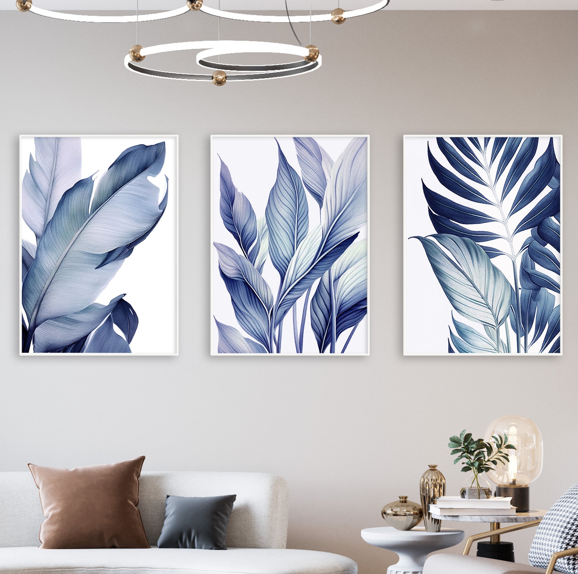 Close-up of a large blue tropical leaf illustration with soft gradients, displayed in a white frame on a minimalist background.


