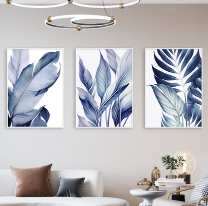 Close-up of a large blue tropical leaf illustration with soft gradients, displayed in a white frame on a minimalist background.

