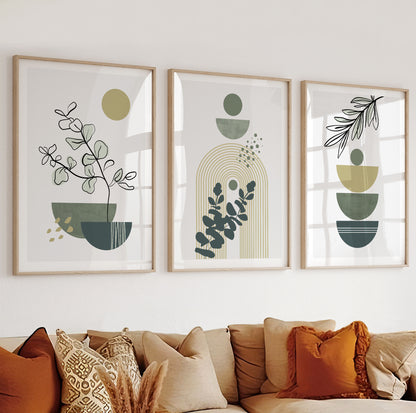 Graphic print with golden arch shapes and green botanical silhouettes in modern minimalism.

