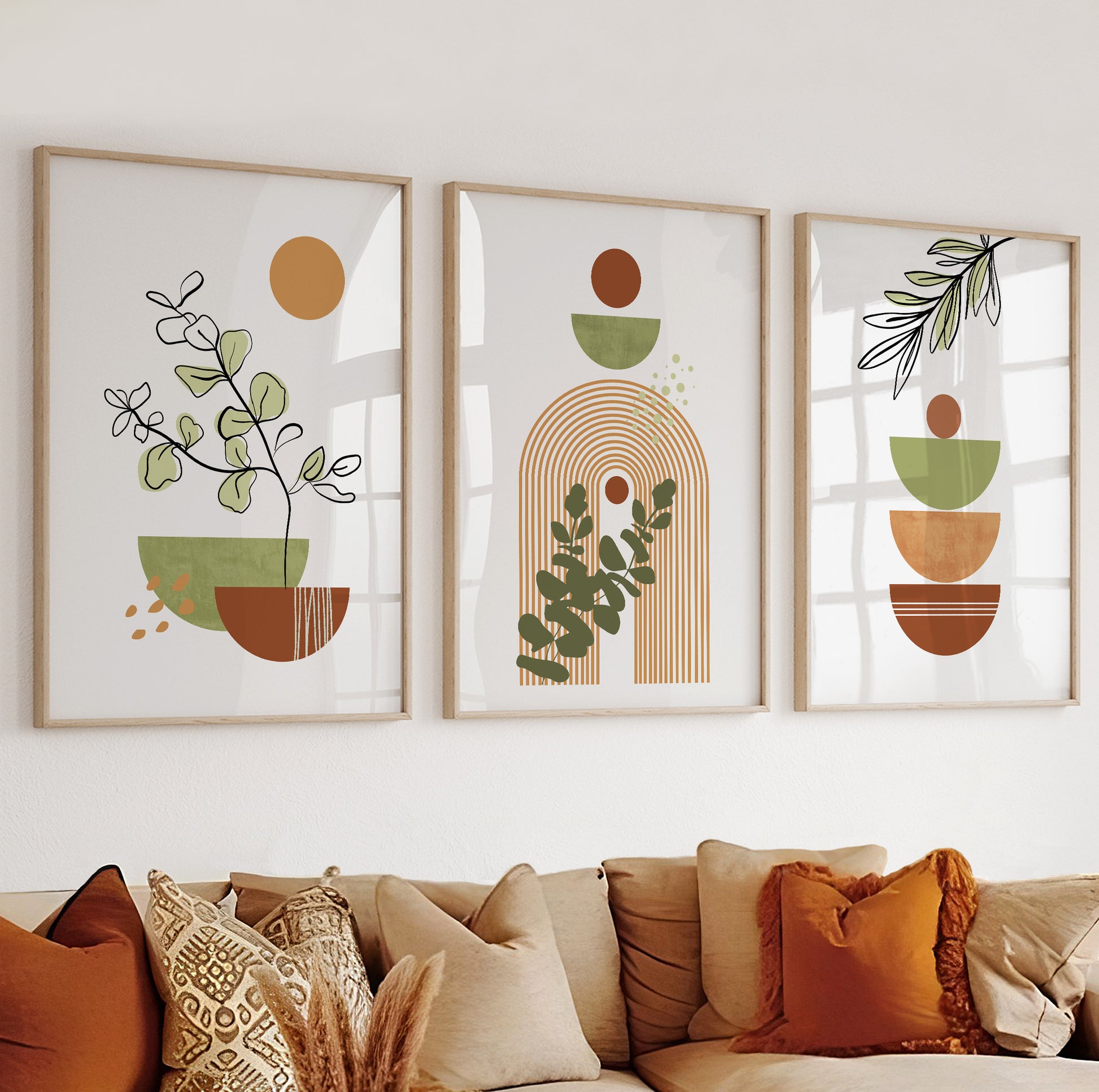 Modern print featuring arched lines in rust-orange with olive plant elements.

