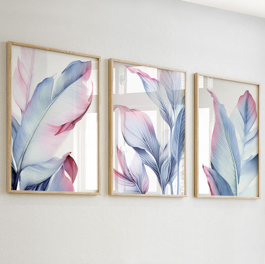 Detailed close-up of a pastel botanical print featuring soft pink and blue tropical leaves in wooden frame.

