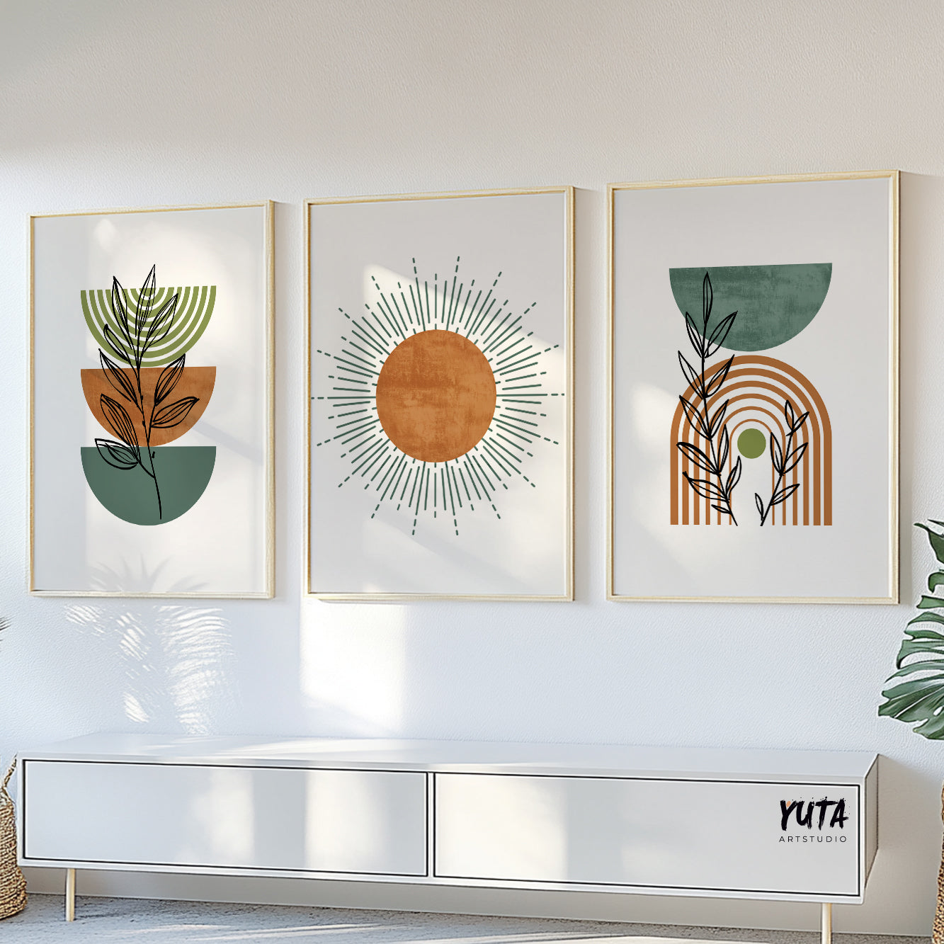 Earthy wall decor prints for a modern bohemian interior with muted green and orange tones