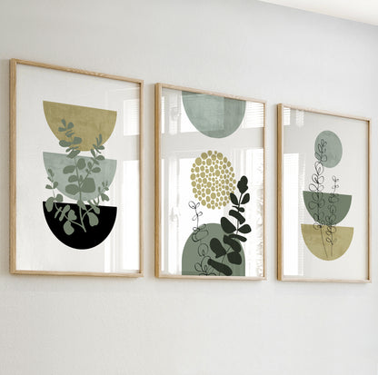 Abstract print with three stacked half-circle pots and botanical silhouettes in green, olive, and black tones.

