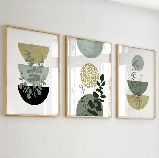 Abstract print with three stacked half-circle pots and botanical silhouettes in green, olive, and black tones.

