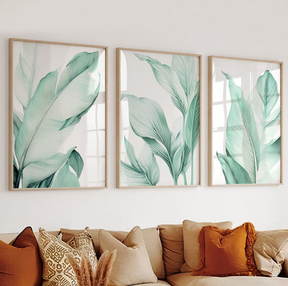 Elegant green palm-inspired leaf design with soft shading, framed in natural wood for clean wall styling.

