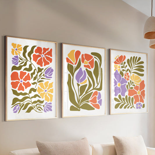 Set of three Matisse-style floral prints with light colorful minimalist botanical designs for mid-century gallery walls.