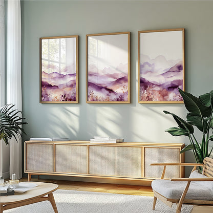 Minimalist nature wall art set featuring abstract mountain silhouettes in soft lilac and purple watercolor, perfect for tranquil room atmospheres.