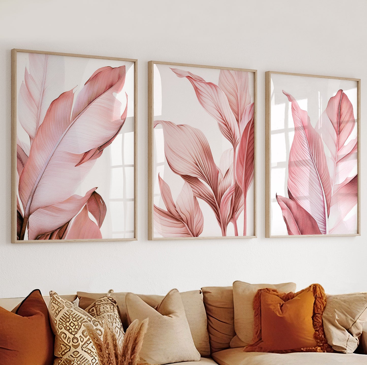 Stylized palm leaf artwork in pink tones, forming part of a cohesive three-piece botanical print set.

