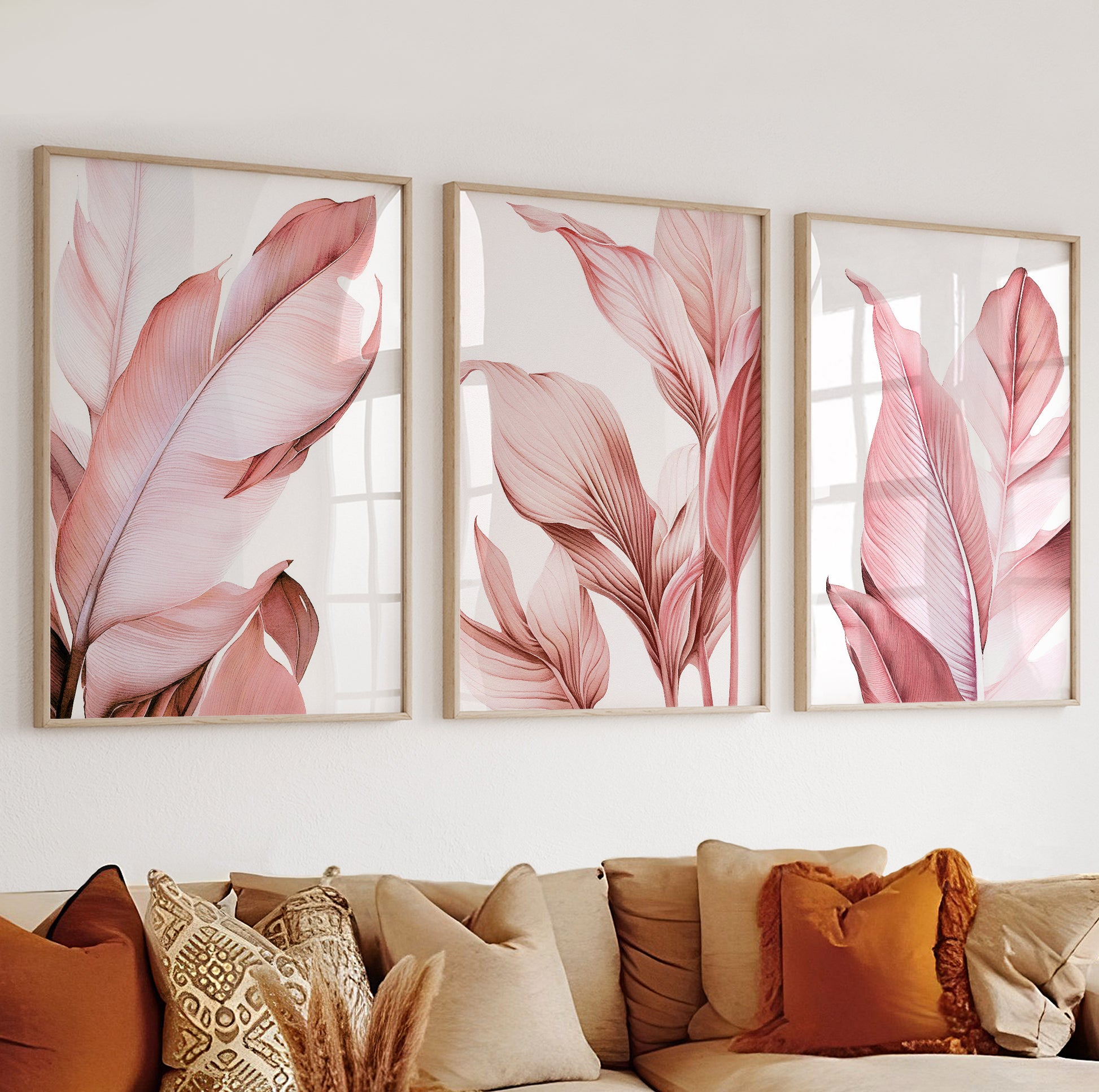 Stylized palm leaf artwork in pink tones, forming part of a cohesive three-piece botanical print set.

