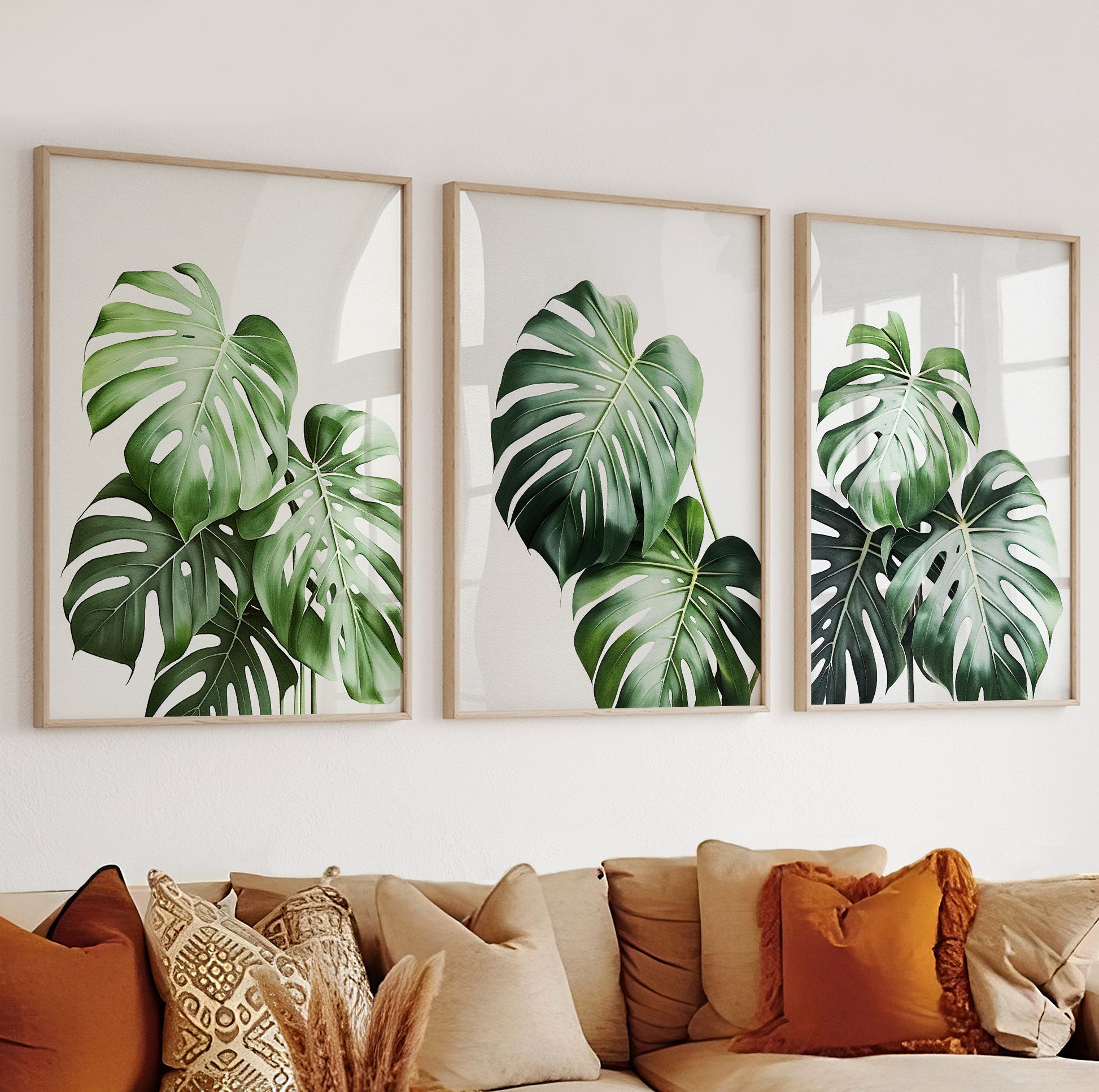 Central print with bold monstera foliage in rich tropical greens and minimal style.

