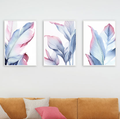 Light and airy Scandinavian-style room with framed blush blue leaf illustrations creating a peaceful vibe.

