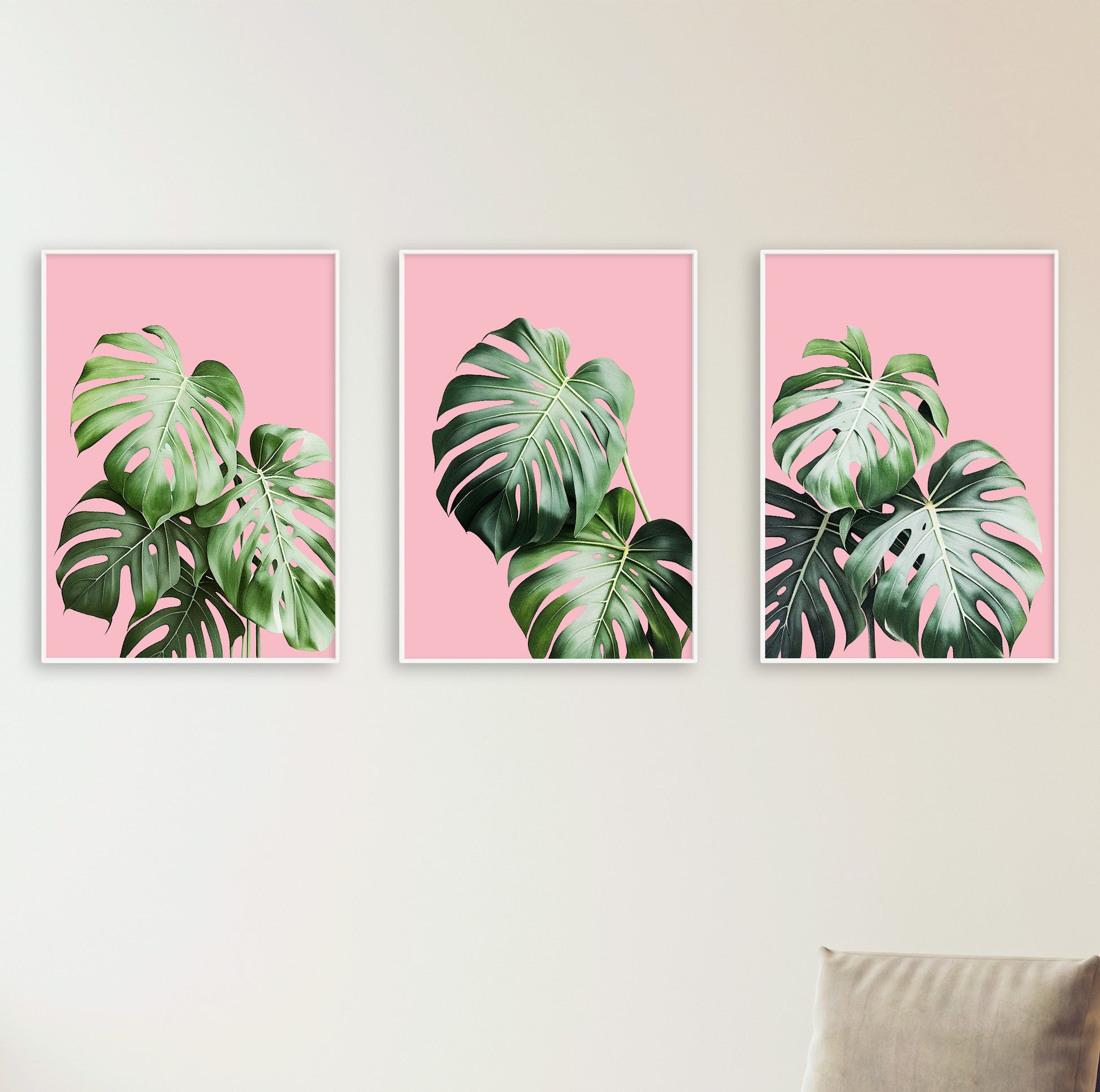 Set of three tropical leaf prints with playful pink background for lively home interiors.

