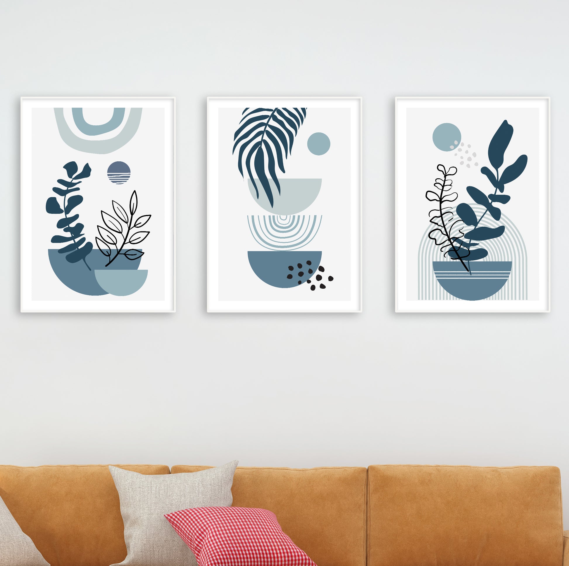 Coastal-style prints featuring abstract foliage and blue-toned pottery shapes on clean background.

